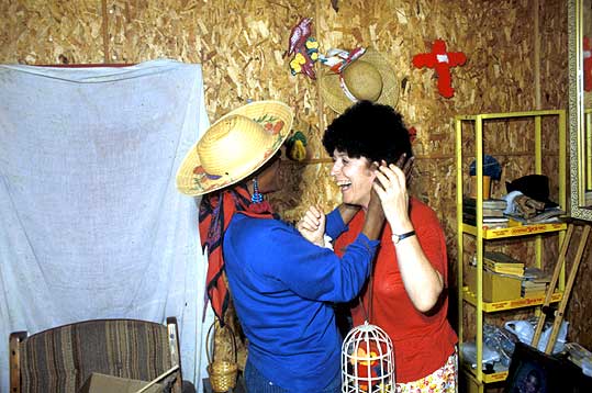 Anita Roddick tries Mary's wig