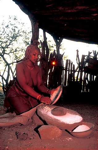 My hostess grinding corn