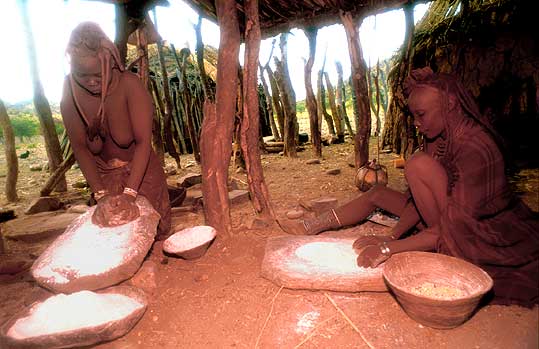 Two neighbors grinding flower
