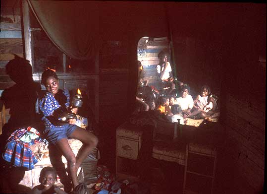 Children with oil lamp in Mississippi