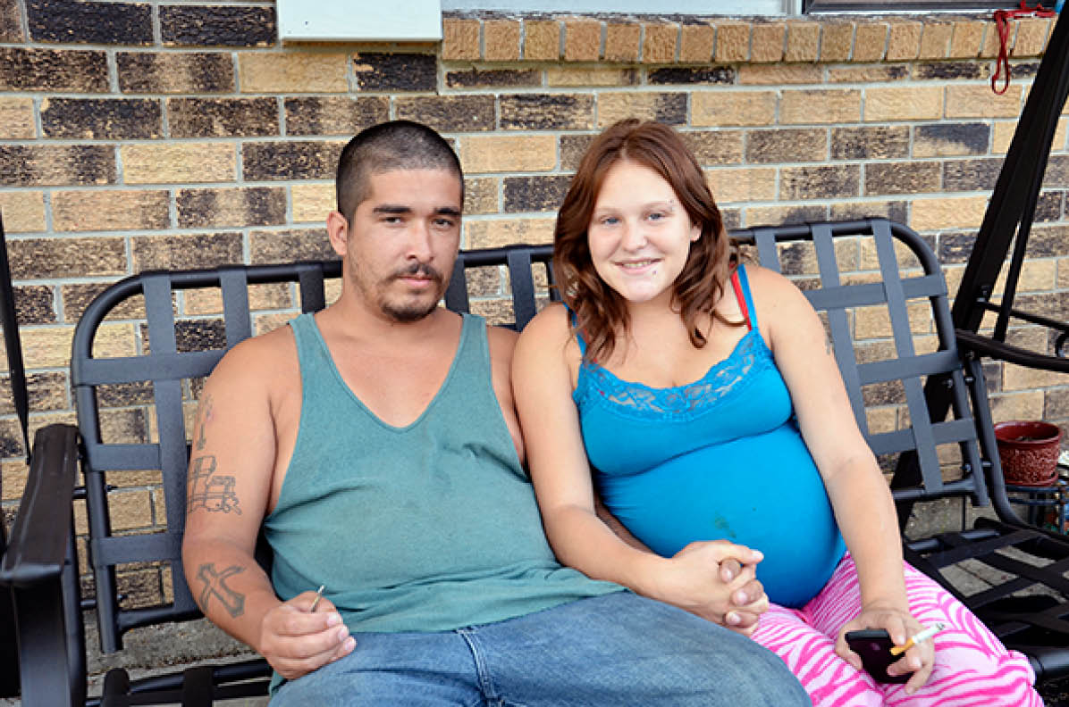 Angel pregnant with her temporary husband in 2012