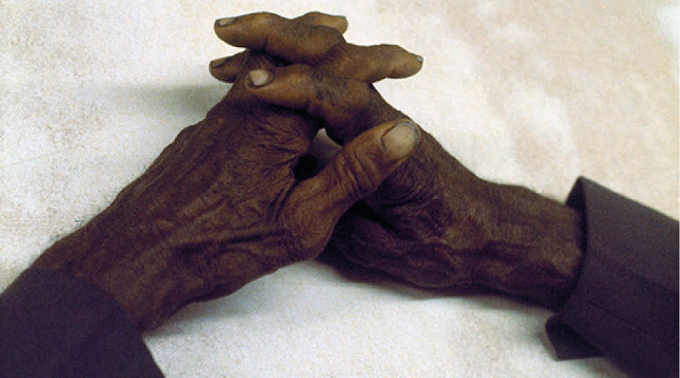 1975 - Philadelphia, MS  Hands of my father-in-law, Rev  Jake Rush 