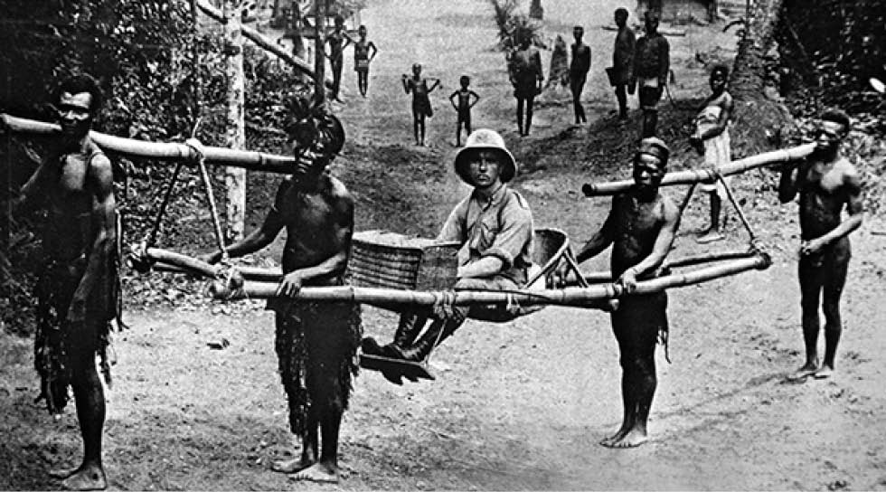 White being carried by Africans
