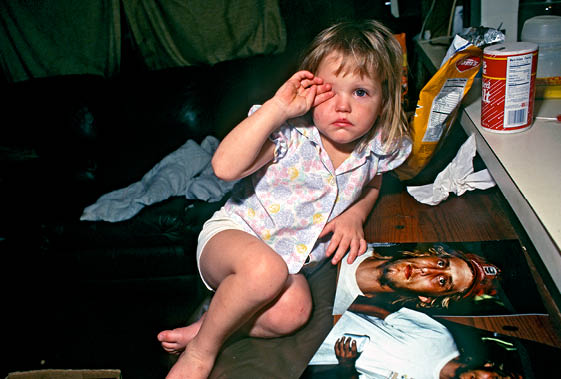 Angel at two with her uncle Woody who later raped her
